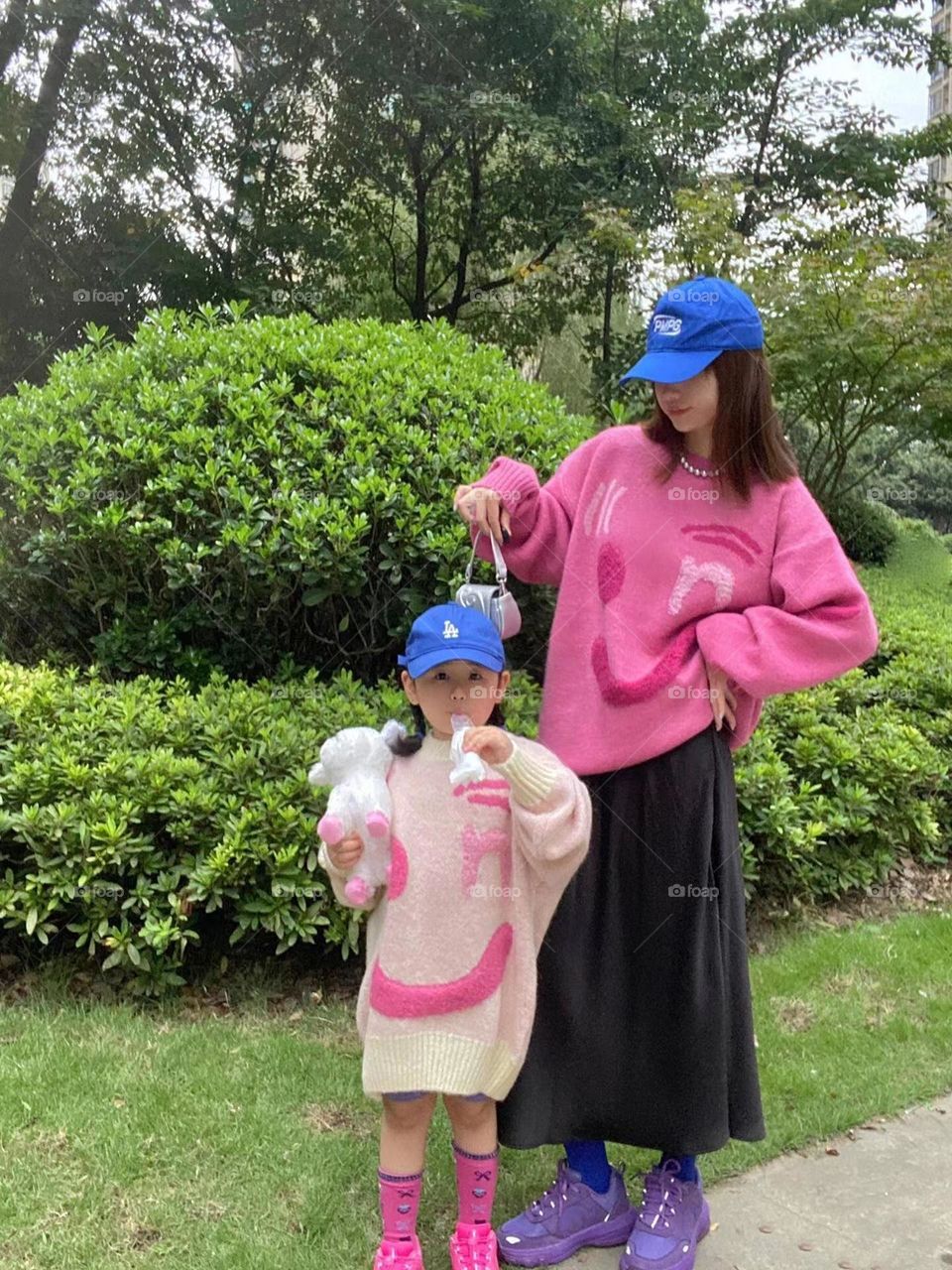 Mum and daughter , lovely pink