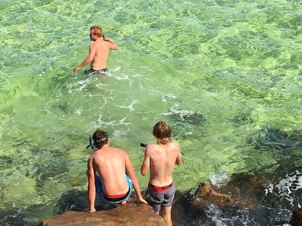 Local Youth having fun Oceanside and about to go snorkelling in south Australia 