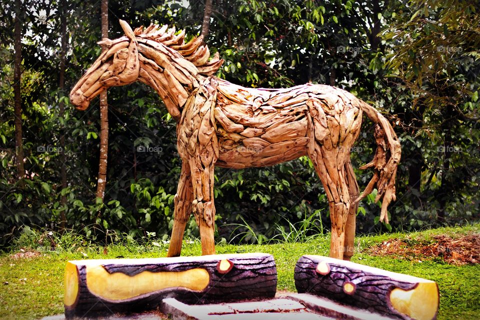 wooden horse statue