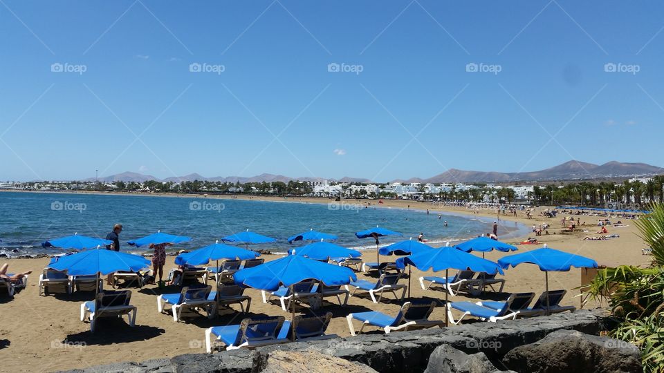 Sun loungers, Playa de los Pocillos, Lanzarote