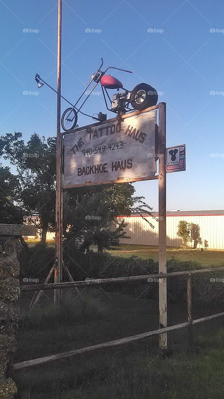 backhoe service 3. This is a neat picture of a backhoe service sign that I saw while out exploring East Texas