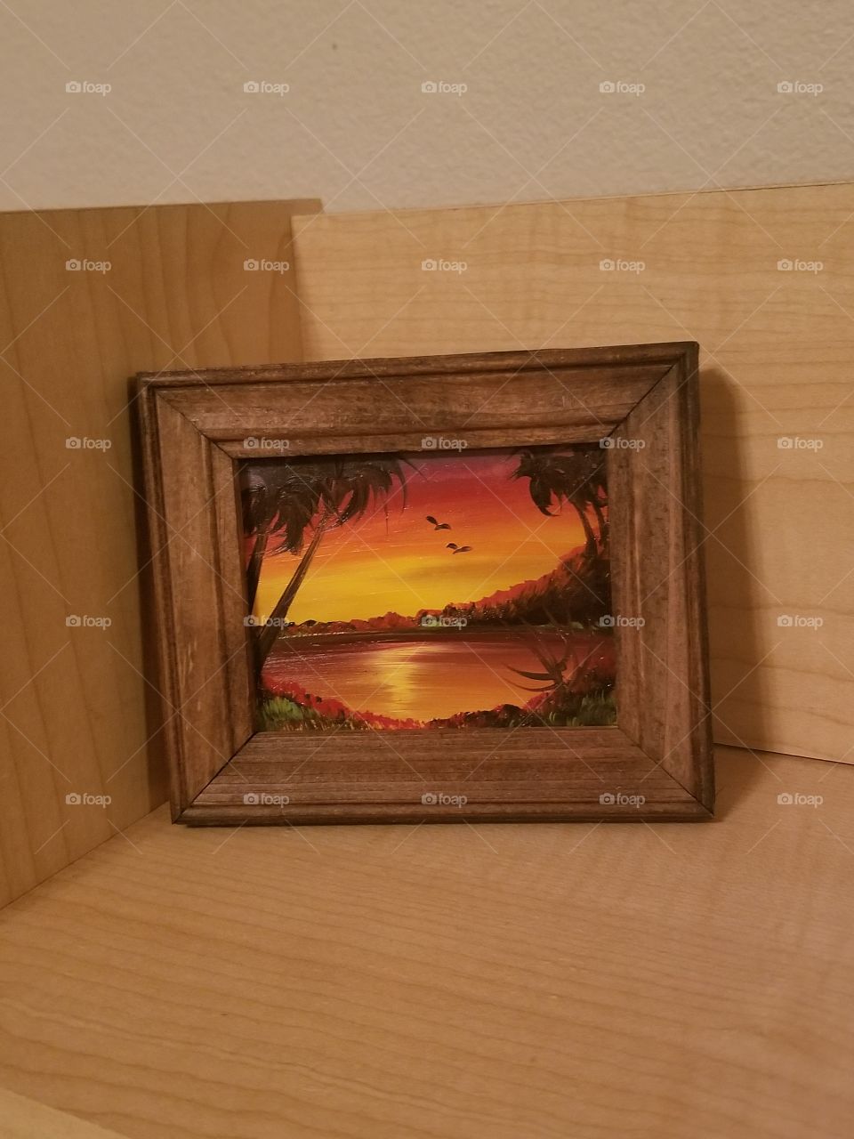 I bought this picture in Mexico from a local street artists. He hand painted the picture and hand framed the frame! He sells in a local park in Mexico City and he has many other art works design!