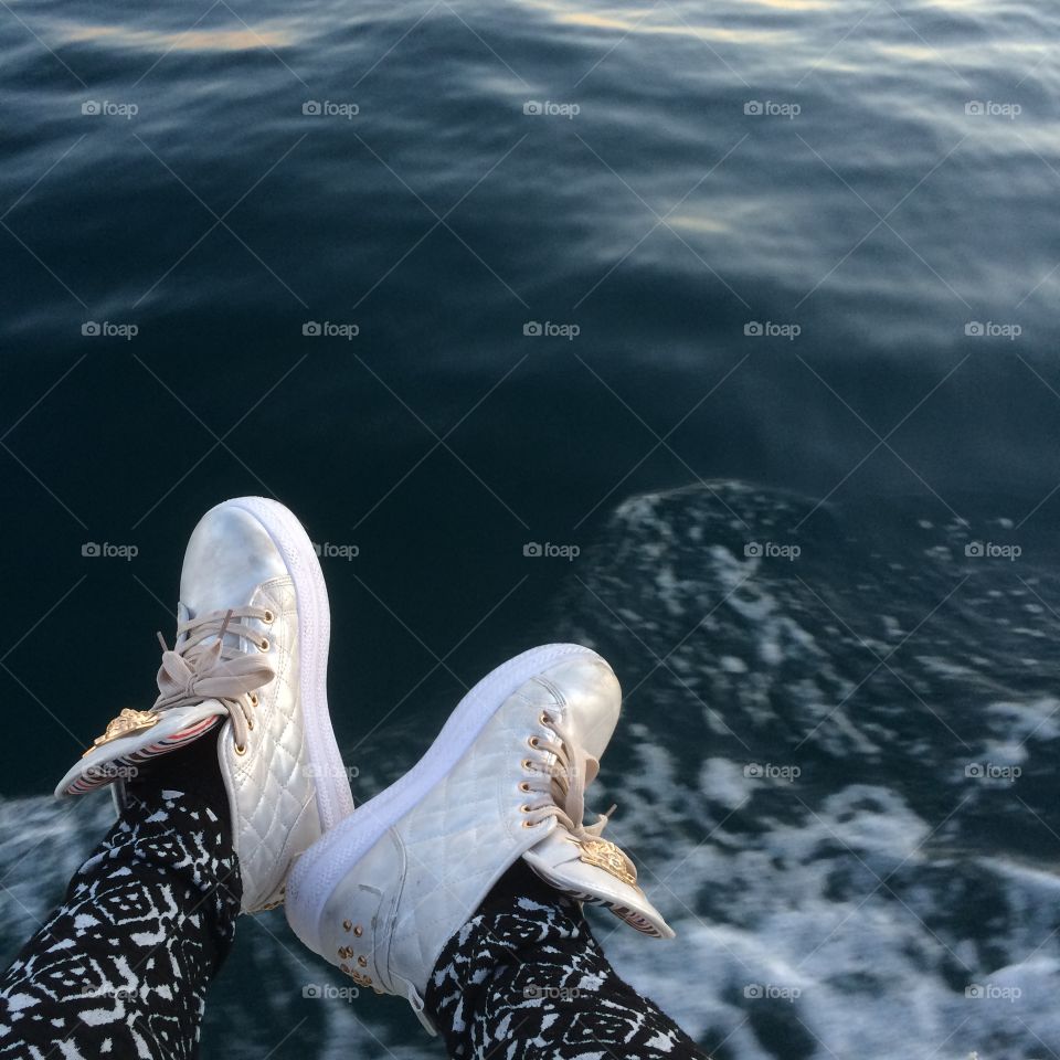 View of my feet and the sea water