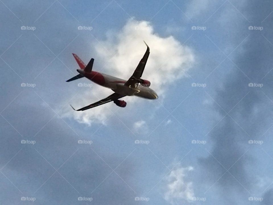 Beautiful airplane flying cross the sky