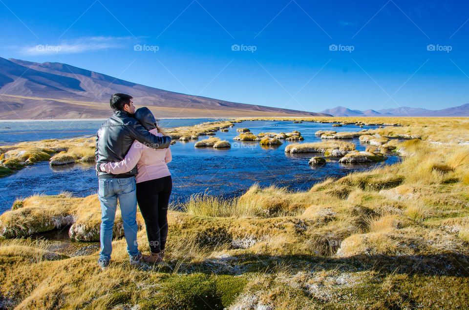 couple in highland lagoon