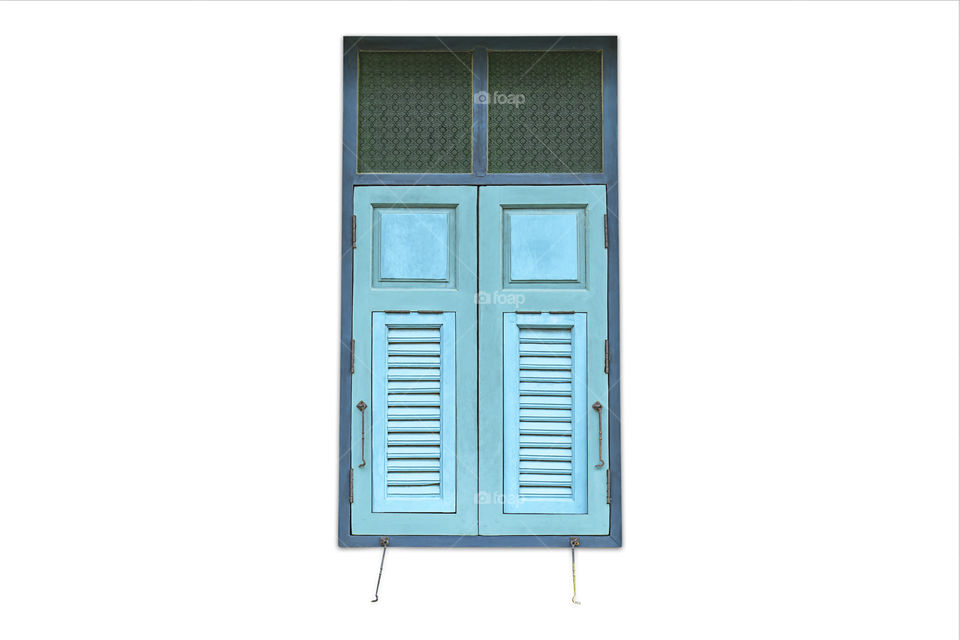 Isolated Wooden window with green glass on a white background with clipping path.