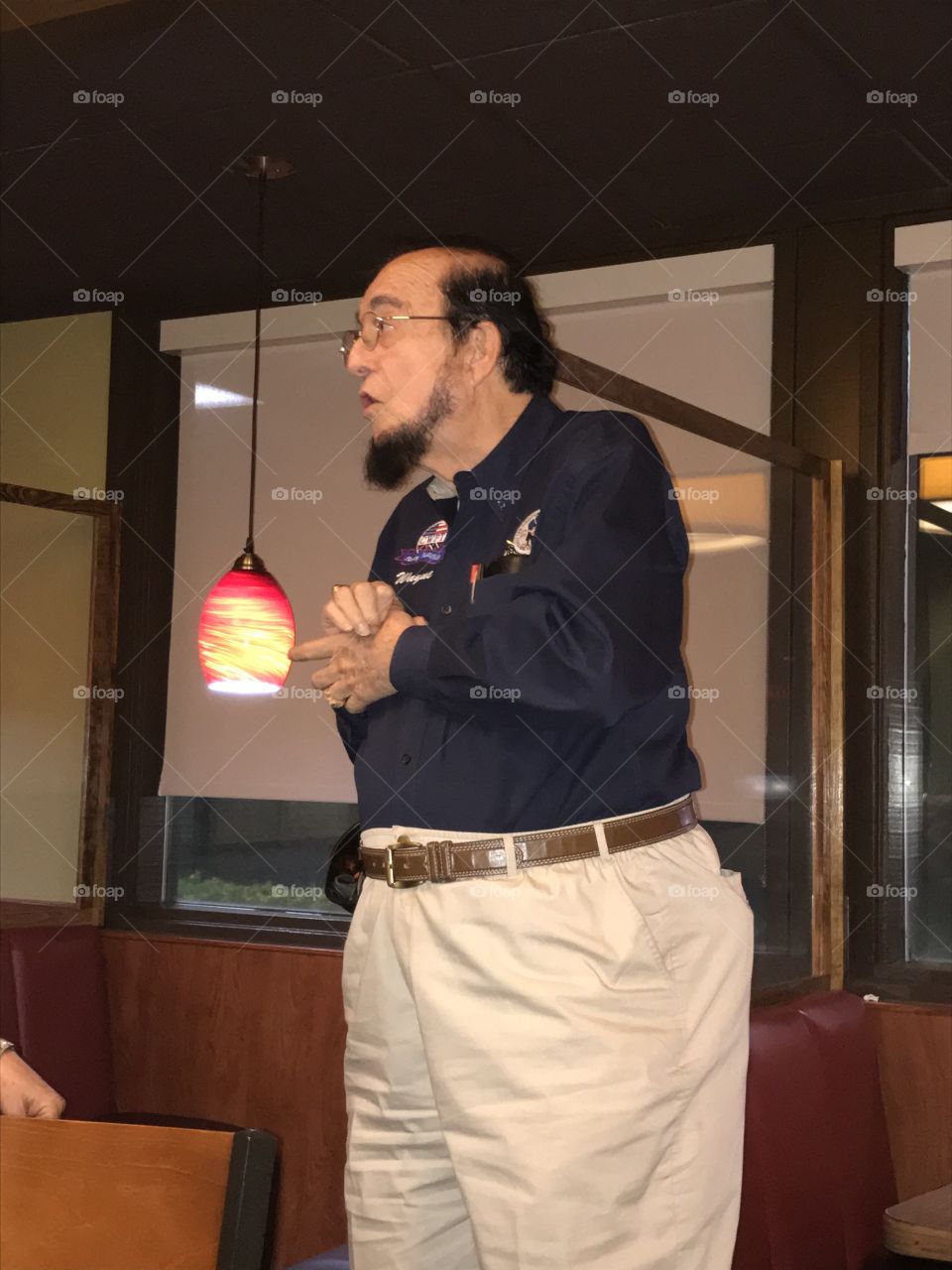 Abe Lincoln giving a farewell speech at the end of a dinner gathering. Mr. President shows confidence and boldness as he expresses what needs to be said.