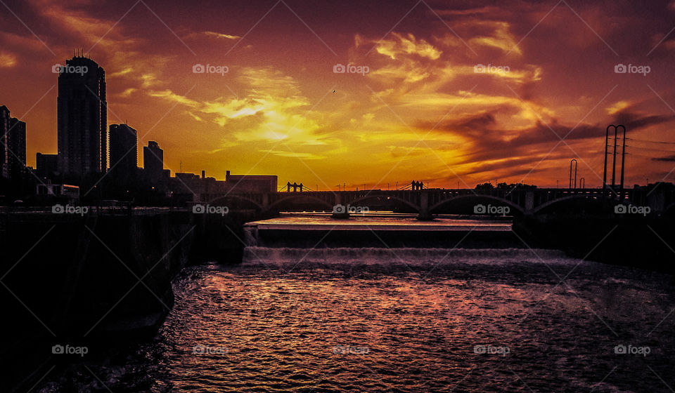 Sunset from The Stone Arch Bridge, overlooking The Mississippi River, in downtown Minneapolis.