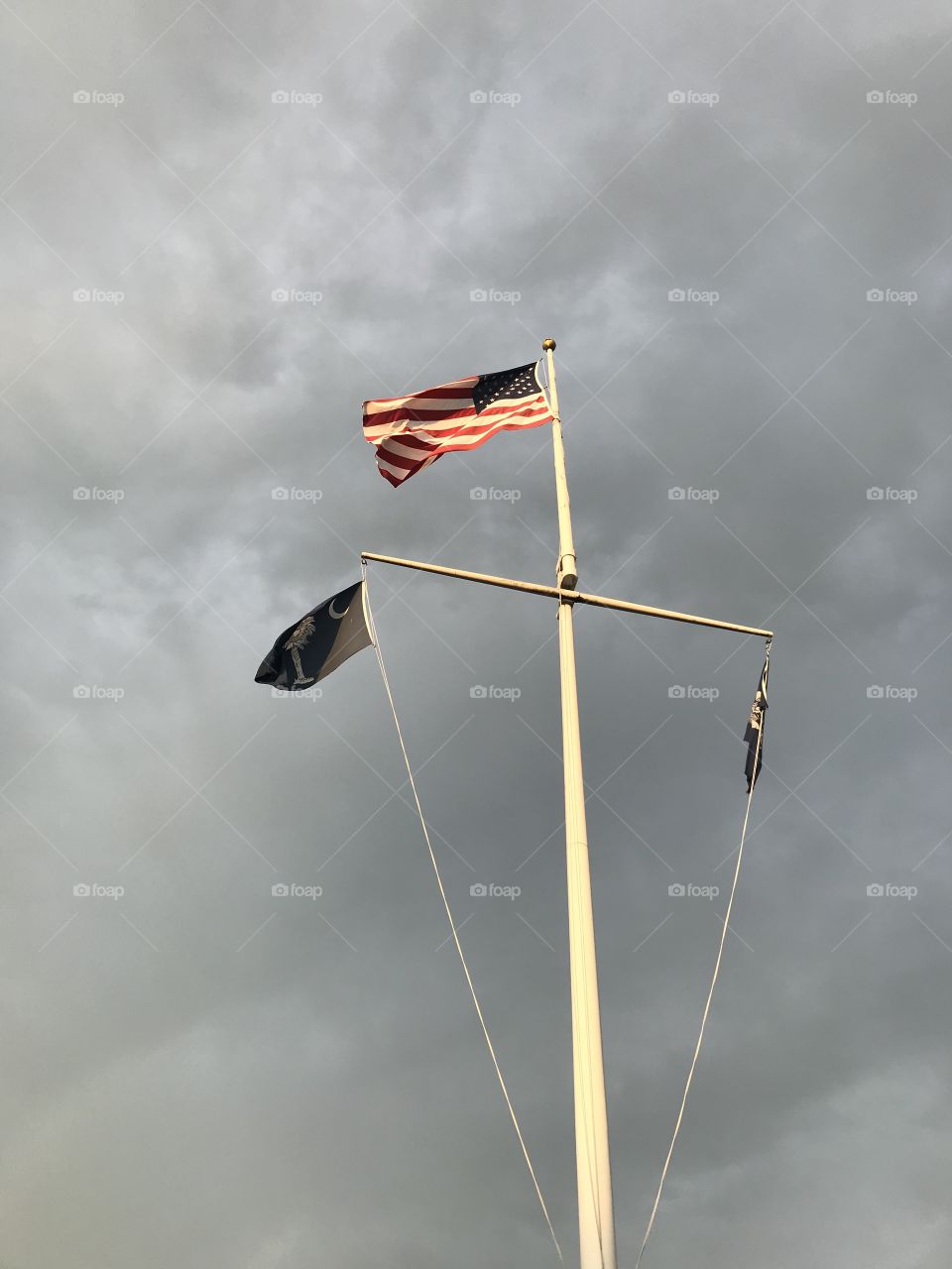 American flag blowing in the evening breeze