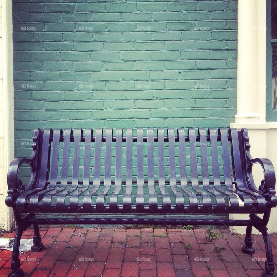 Empty sidewalk bench