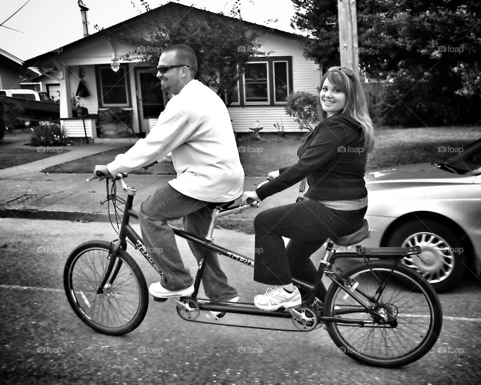 Tandem. Cruising the streets in tandem