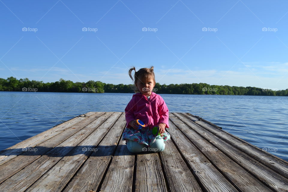 Charlotte on the dock. She liked to mimic my stance
