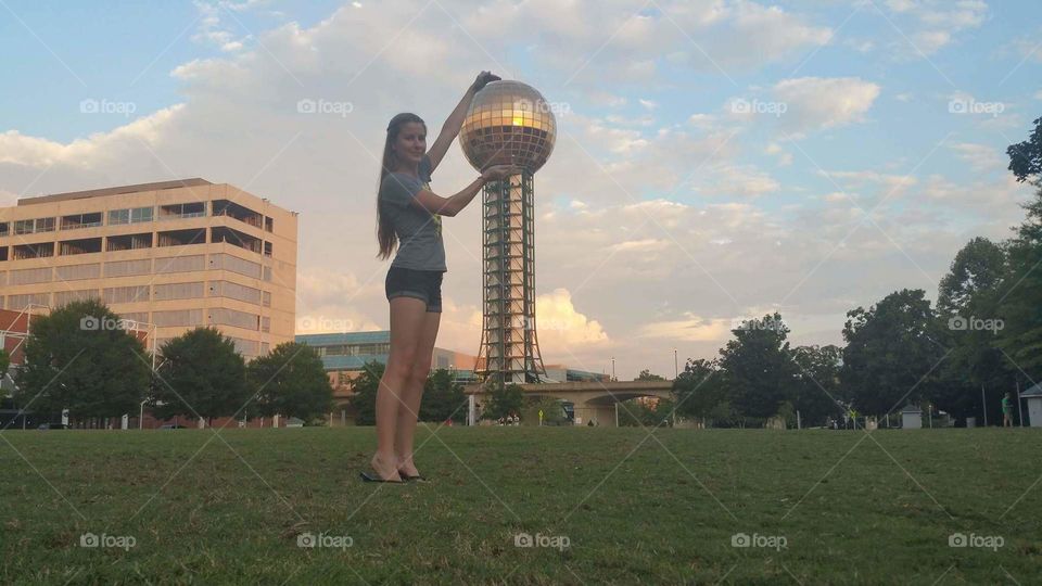 Holding the knoxville sunsphere