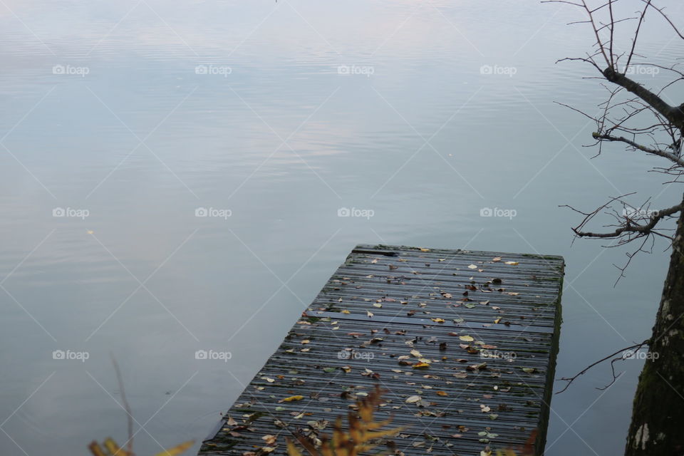 Deserted bridge in dark water