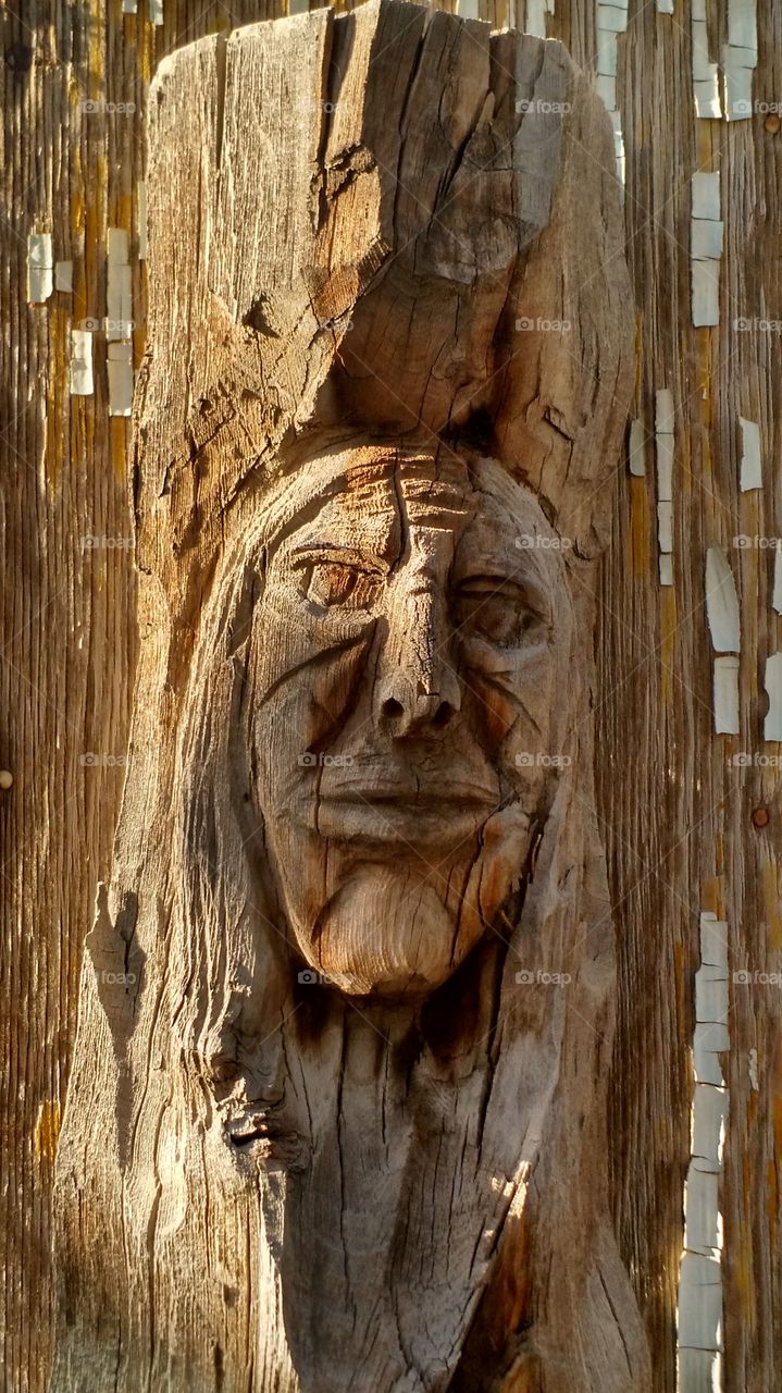Native American carved wood. Photo taken at Bottle Tree Ranch on Route 66