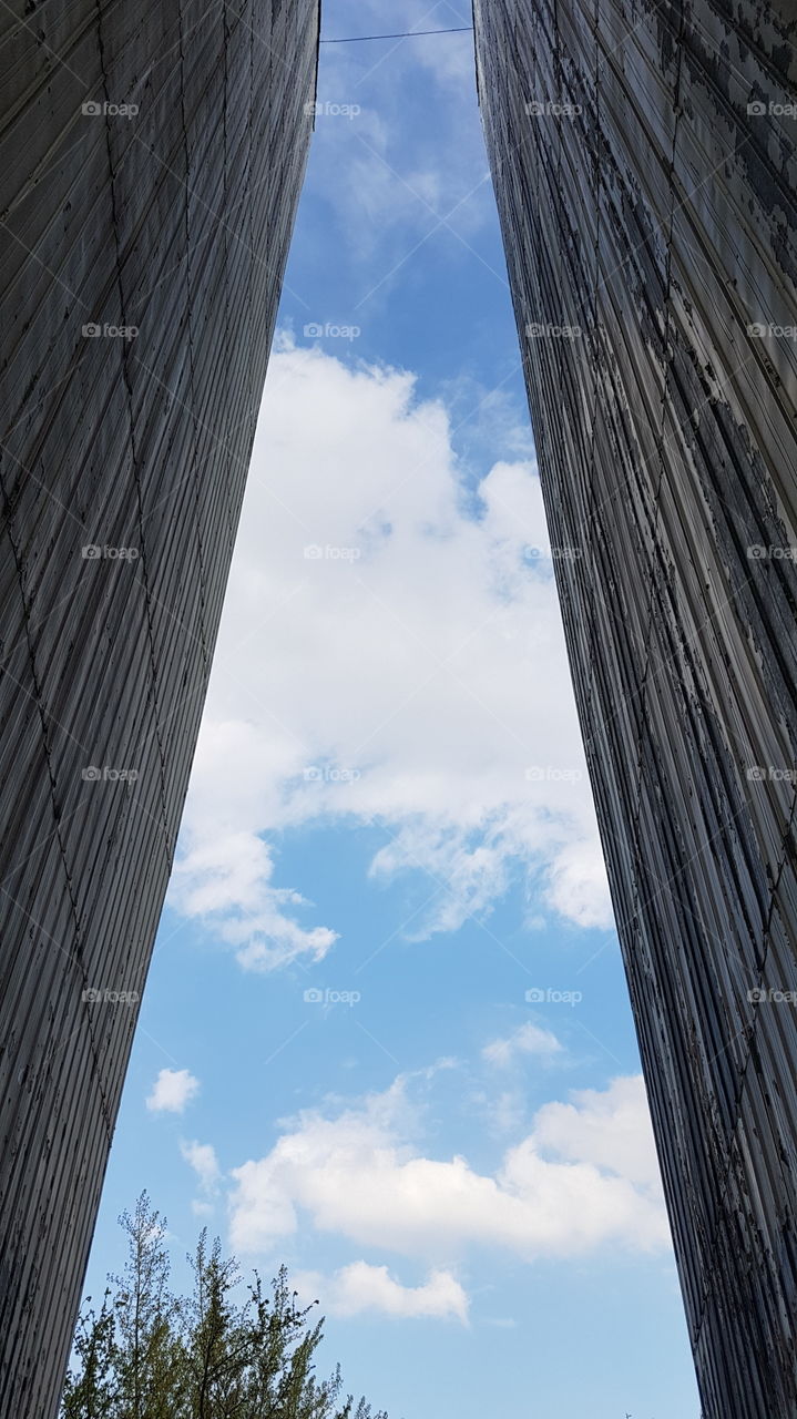 clouds between two buildings