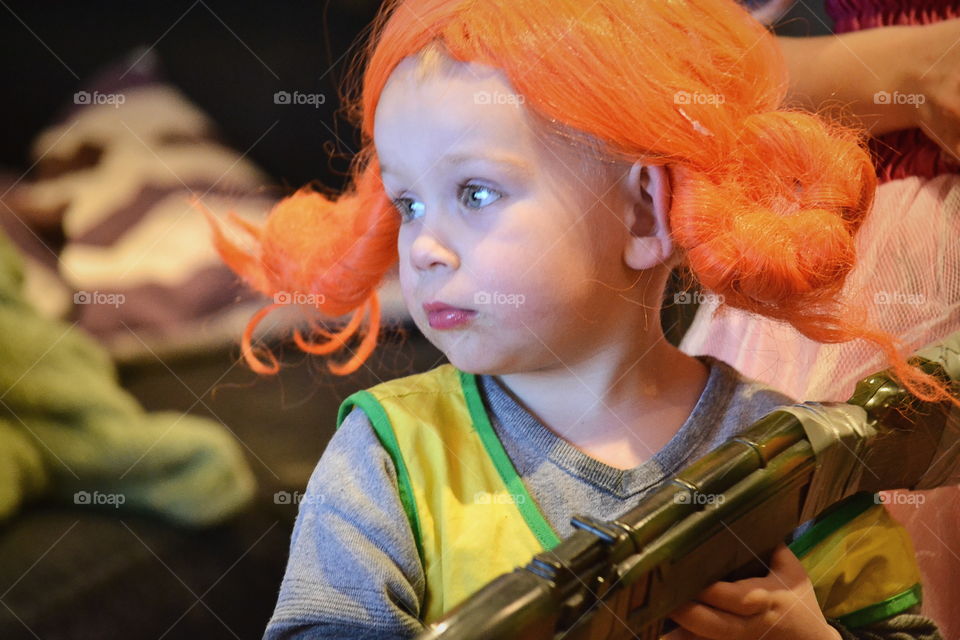 Cute girl with orange wig