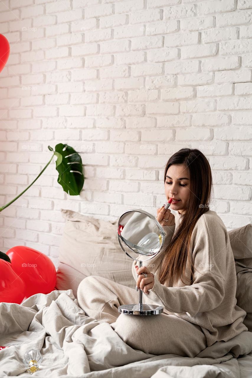 woman using cosmetics