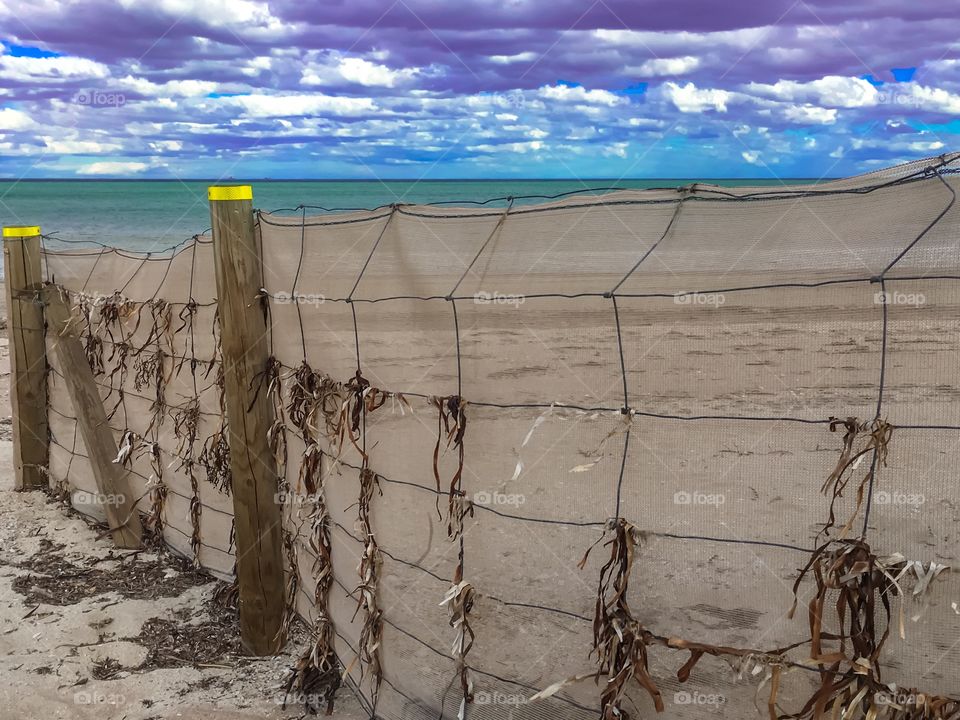 Beach sand barrier mesh screen; seaweed, beach sand preservation. 