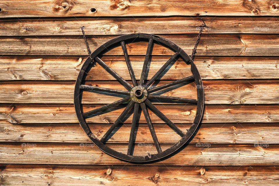 Iron Wheel on Old Boards