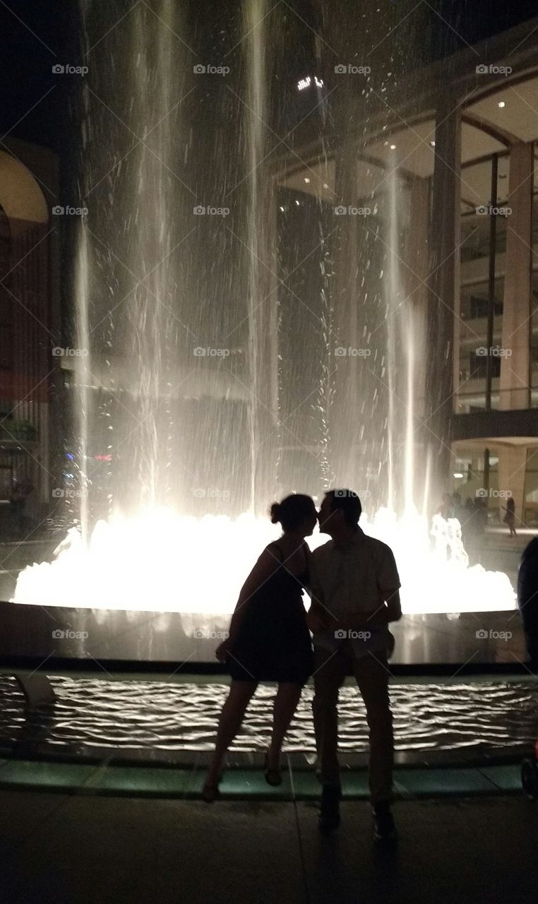 Couple about to Kiss At LincolnCenter Fountain