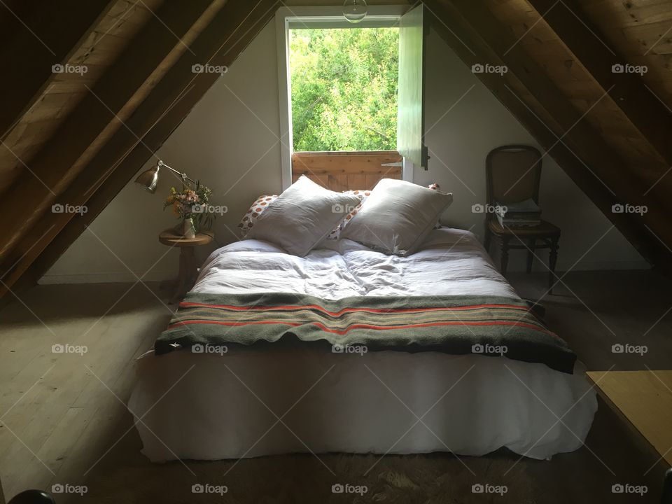 A frame cabin bedroom