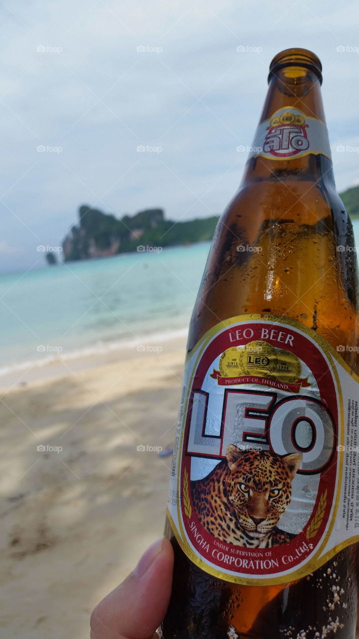 leo beer on the beach of phi phi