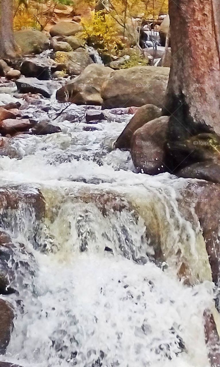 Rushing creek waterfall in  colorful Colorado 
