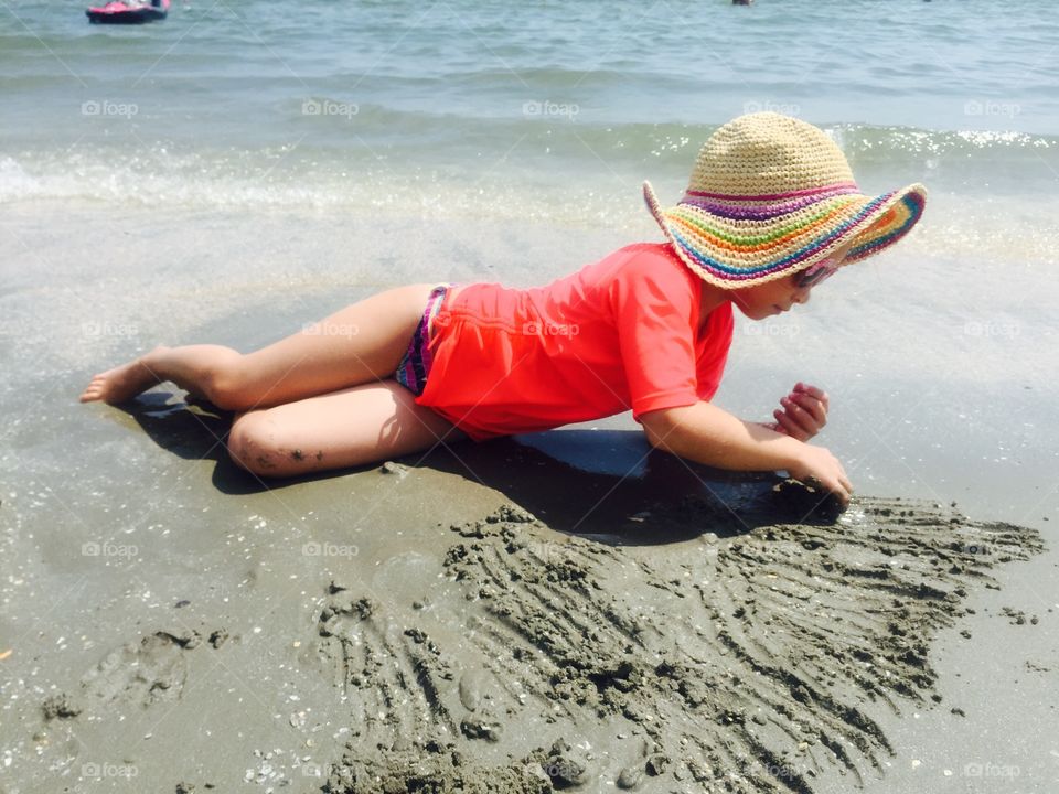 Kids playing in the sand