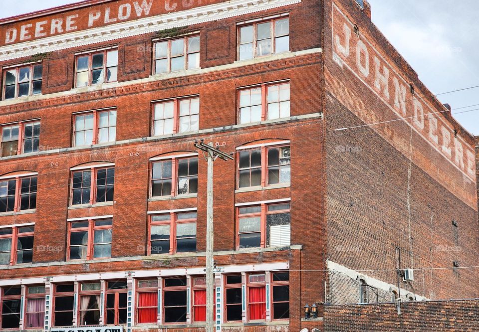 A revitalization project has brought life to downtown Kansas City including the historic John Deere tractor building