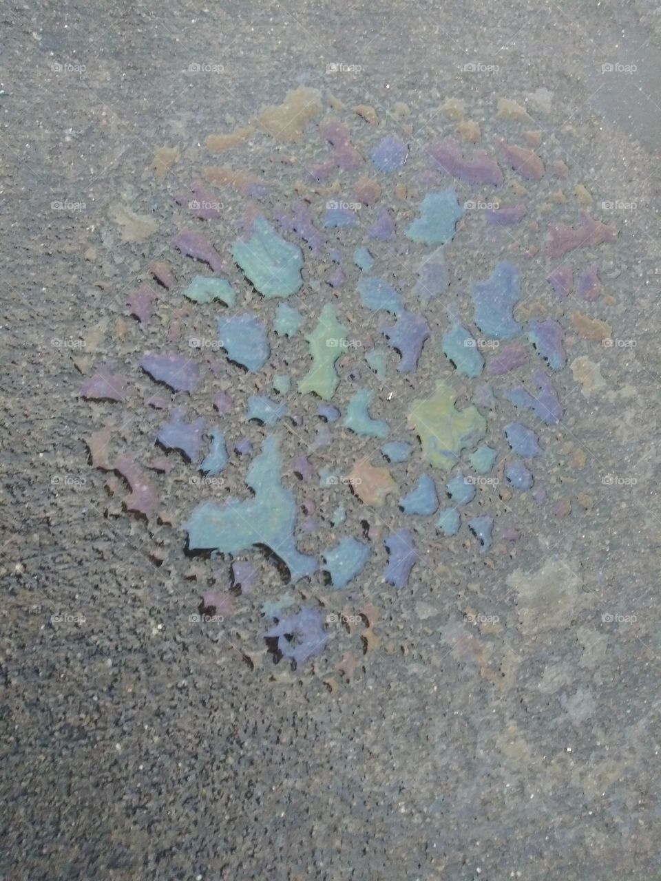 Rainbow oil on concrete 
