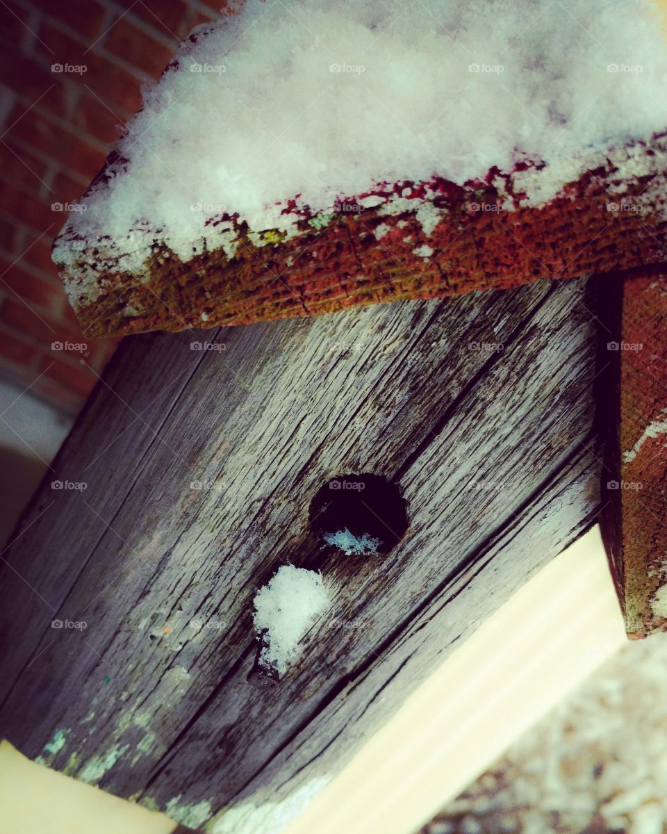 snowy birdhouse
