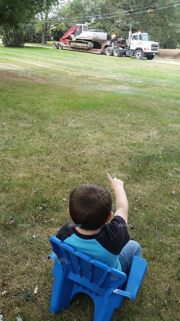 boy with crane. South Lyon, Michigan