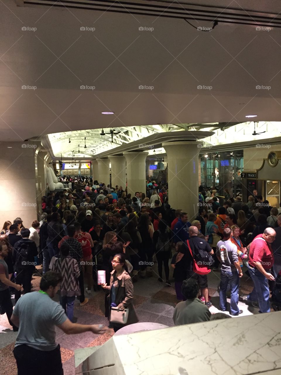 Train delays create backlog of commuters in the waiting area to board New Jersey Transit trains inside New York City train station.