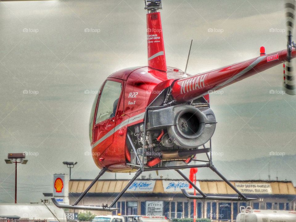 Helicopter Pilot Training. Robinson R-22 Helicopter In A Hover
