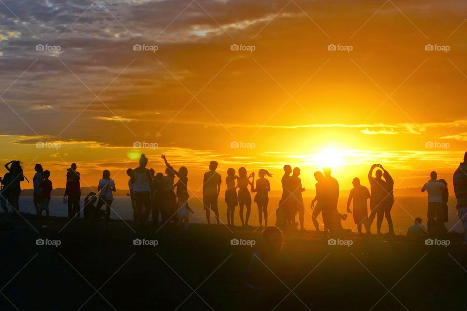 super sunset. sunset over the ocean at farol de barra in brazil