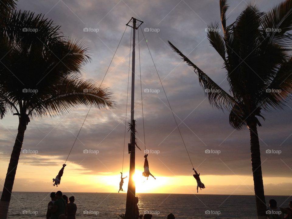 Puerto Vallarta Voladores late launch with coconut trees