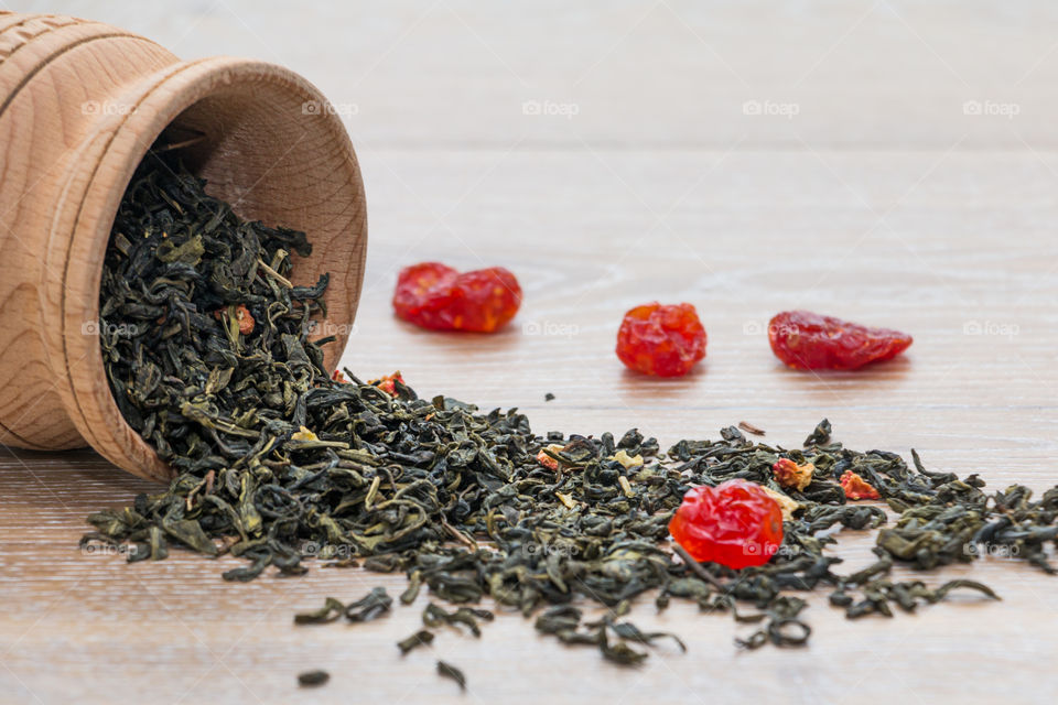 Spilling of tea herbs on table