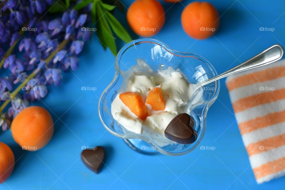 Ice cream with chocolates and fruits