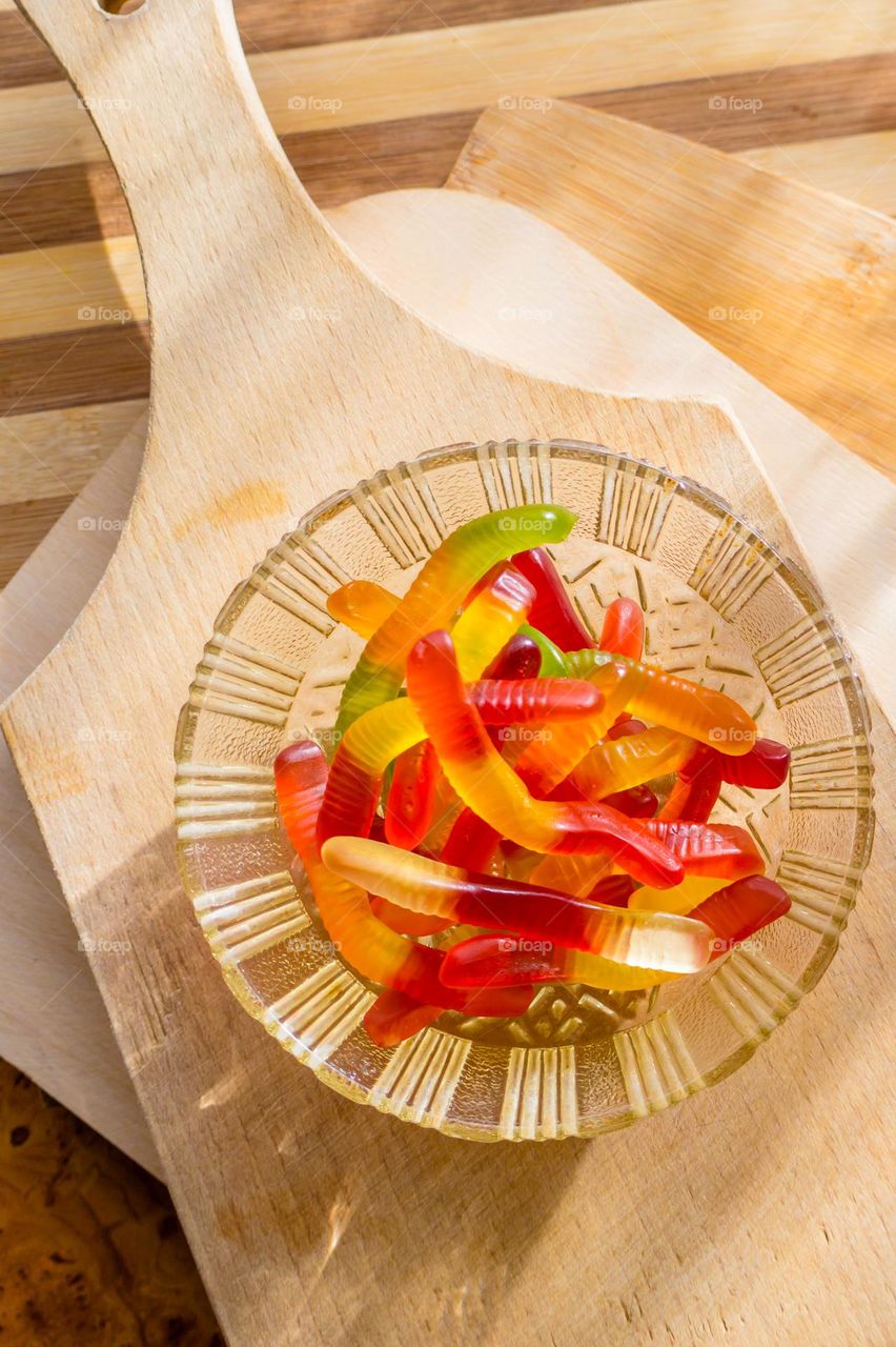 Jelly worms with sweet and sour taste. Sweets for children.