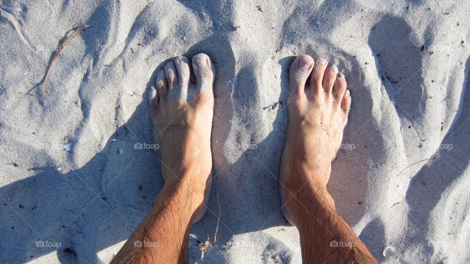 Feet in sand 