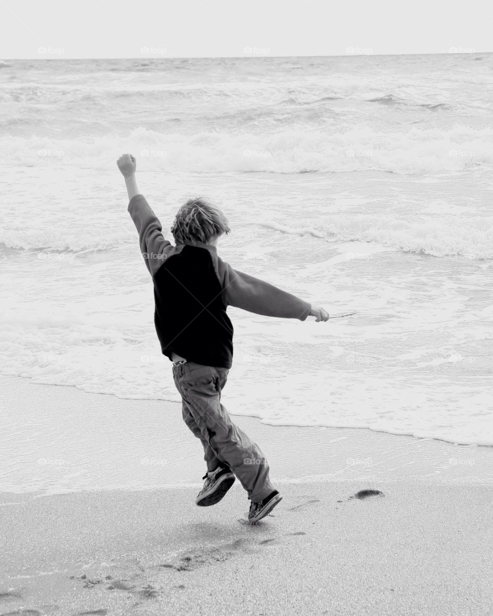 Close-up of a boy at beach