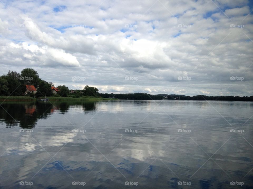 Reflection of cloudscape on lake