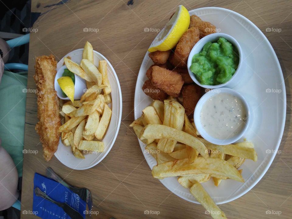 Eating Fish and Chips in Brighton, UK.