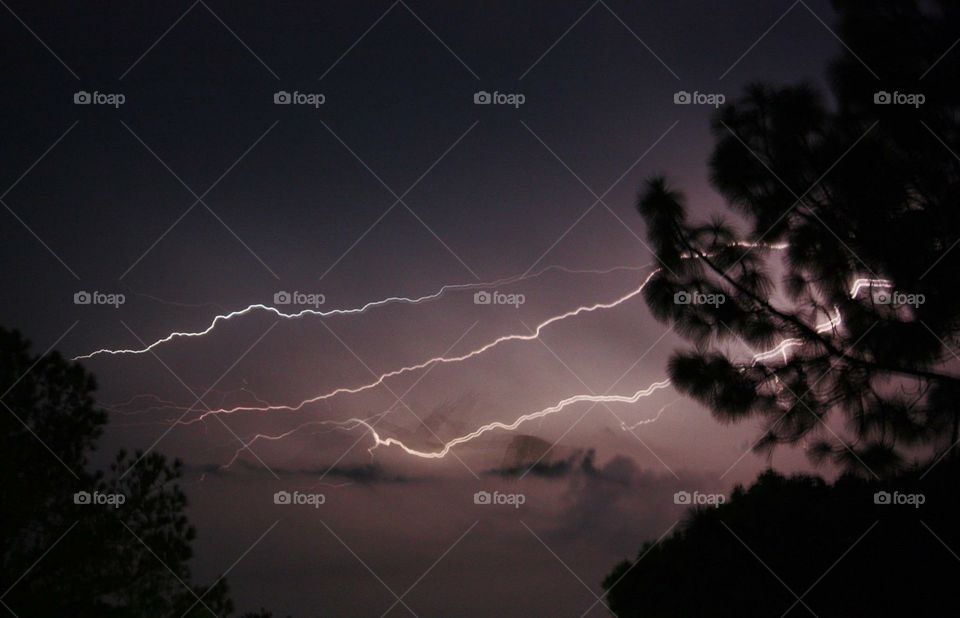 Lightning across the dark sky 