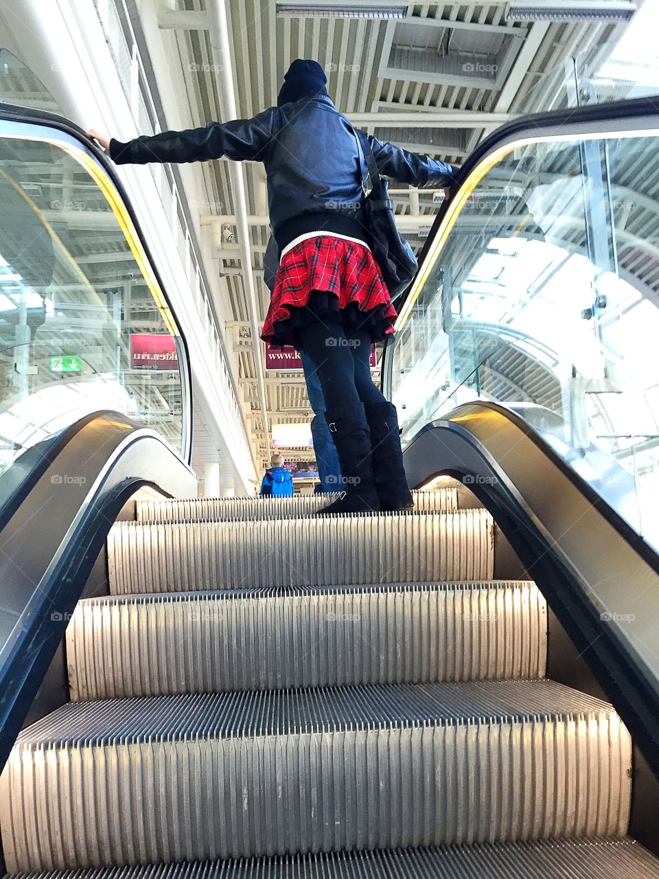 People in a escalator