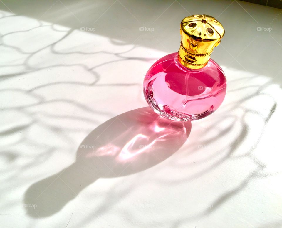 Pink bottle of perfume