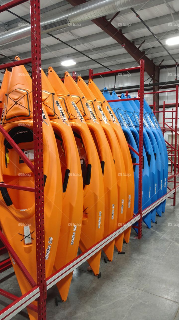 orange and blue kayacks