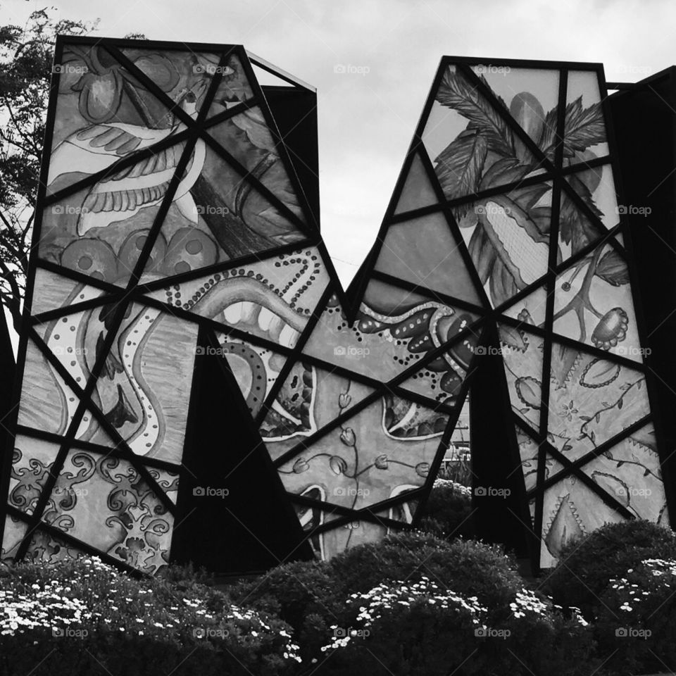 Black and white patterned letter M