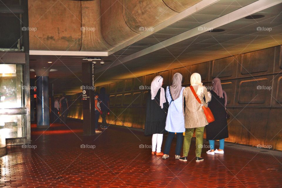 Muslim women waiting for the Metro 